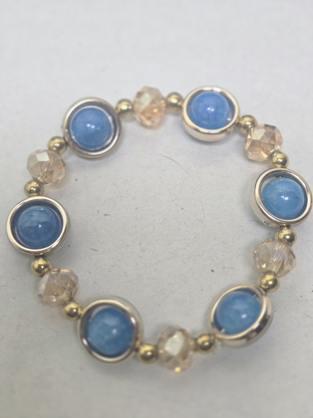 Blue Bead Stretch Bracelet with Gold Accents